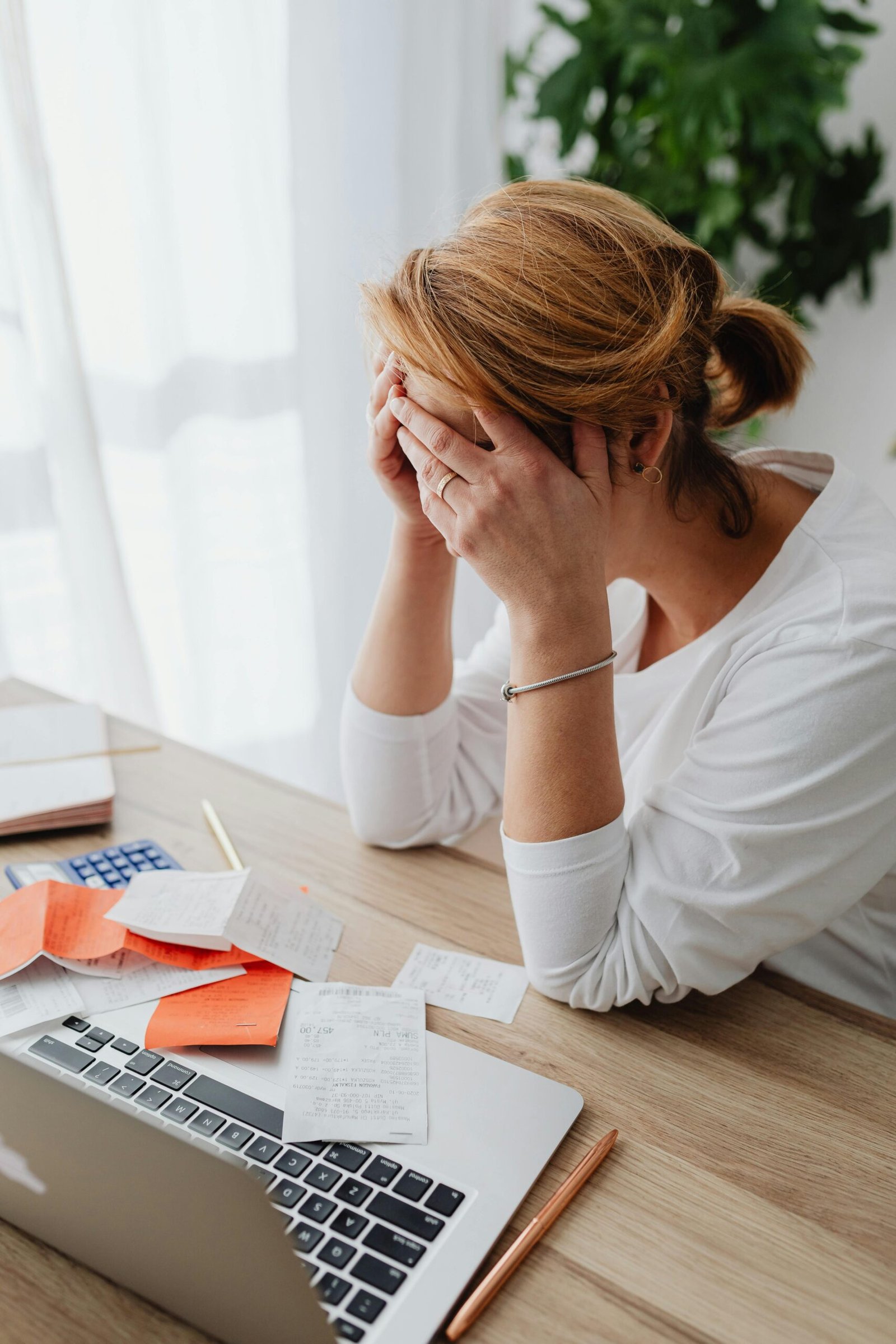 woman looking frustrated over medical bills